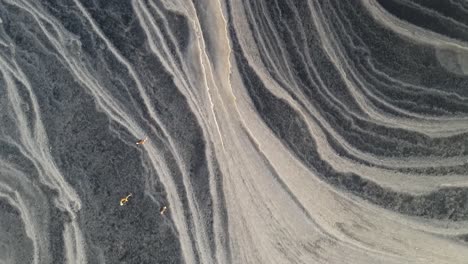 ice skating on a frozen lake with a beautiful pattern created by the wind