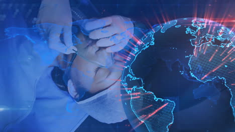 medical professional assisting patient with oxygen mask, global healthcare animation over map