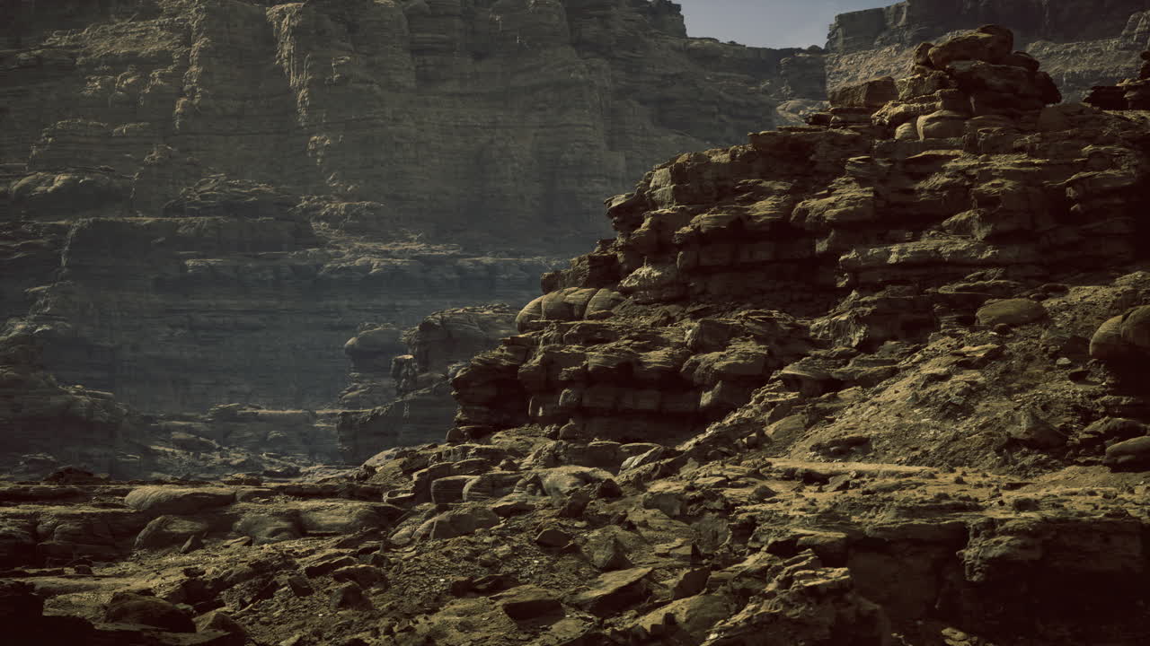 Exploring rocky landscapes in a remote desert environment during golden hour