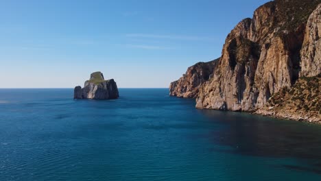 amazing drone aerial of masua coast in south sardinia, sunny day, dolly out