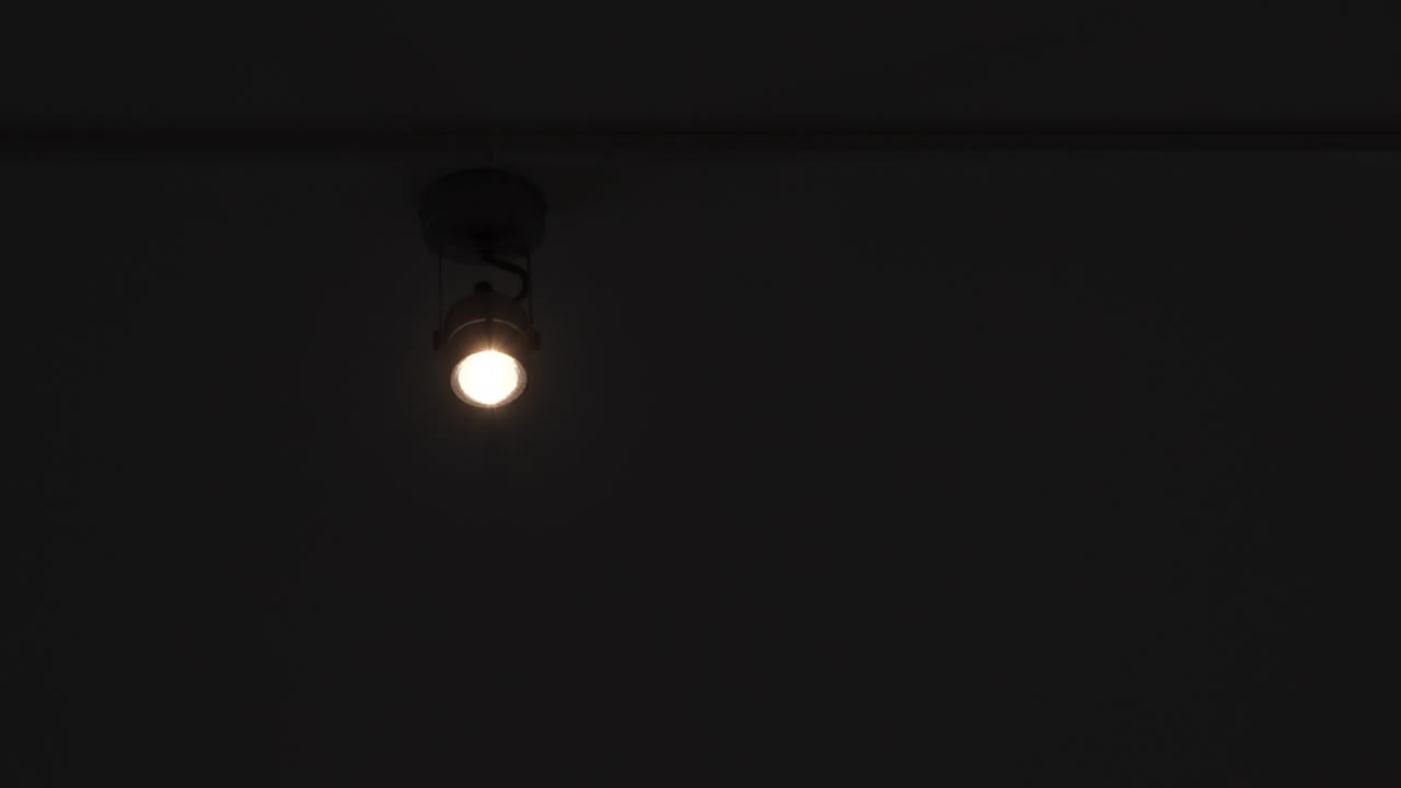 Fluorescent lights turning on and off, close-up