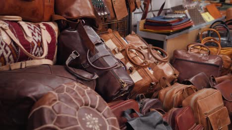 assortment of leather bags and accessories