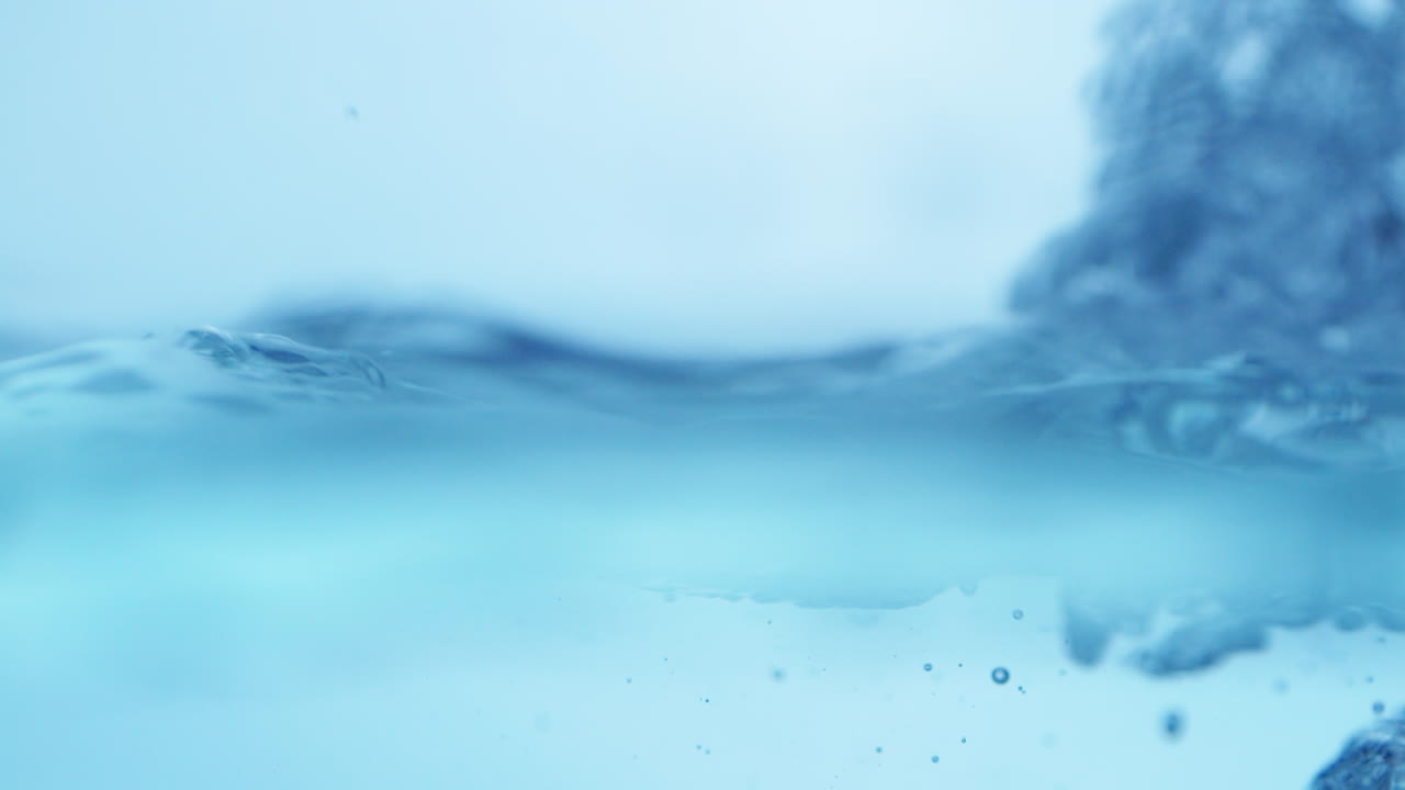 Liquid Tranquility Smooth Flowing Water Surface in Slow Motion