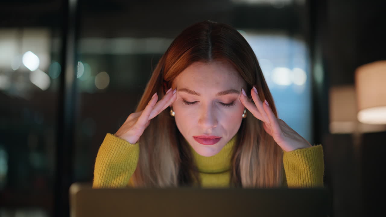 Entrepreneur tired late work sitting dark workplace closeup. Fatigued woman