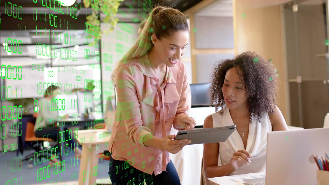 Woman tapping tablet sparking review peer at laptop pointing okaying with green overlay appearing