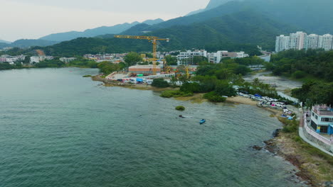 stunning areal panoramic shot of a city close to a calm lake