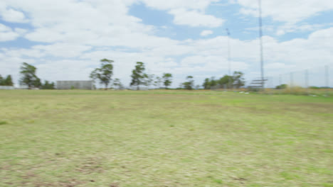 trainer training a shepherd dog in the field 4k