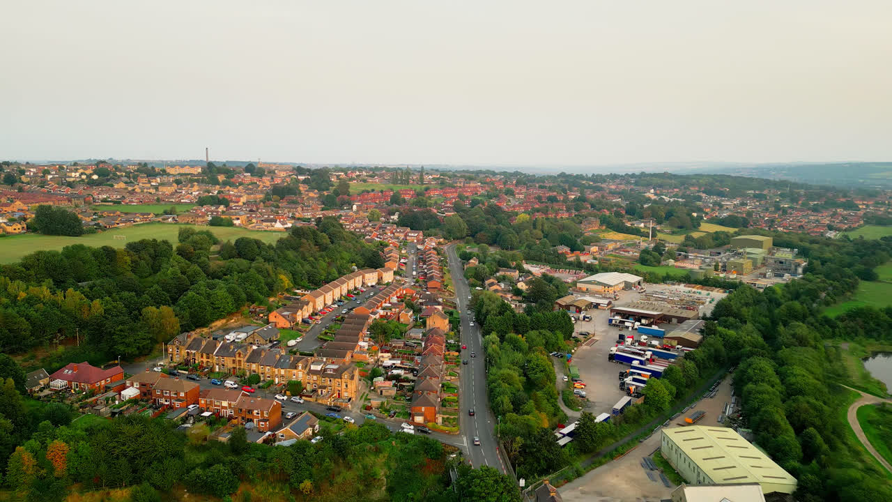 Dewsbury Moore Council estate's allure through breathtaking drone footage, spotlighting the famous urban housing, red-brick terraced homes, and the industrial Yorkshire charm