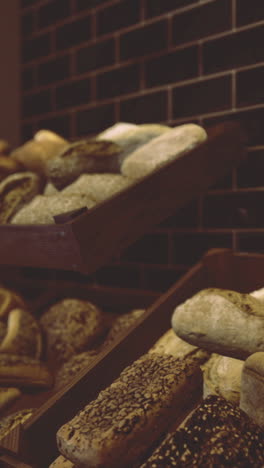 freshly baked artisan bread displays in a contemporary bakery setting