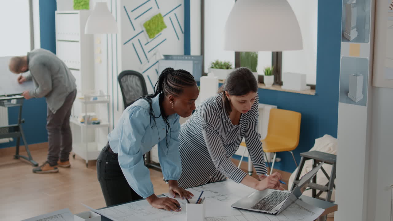 Team of architects working on a project in an office