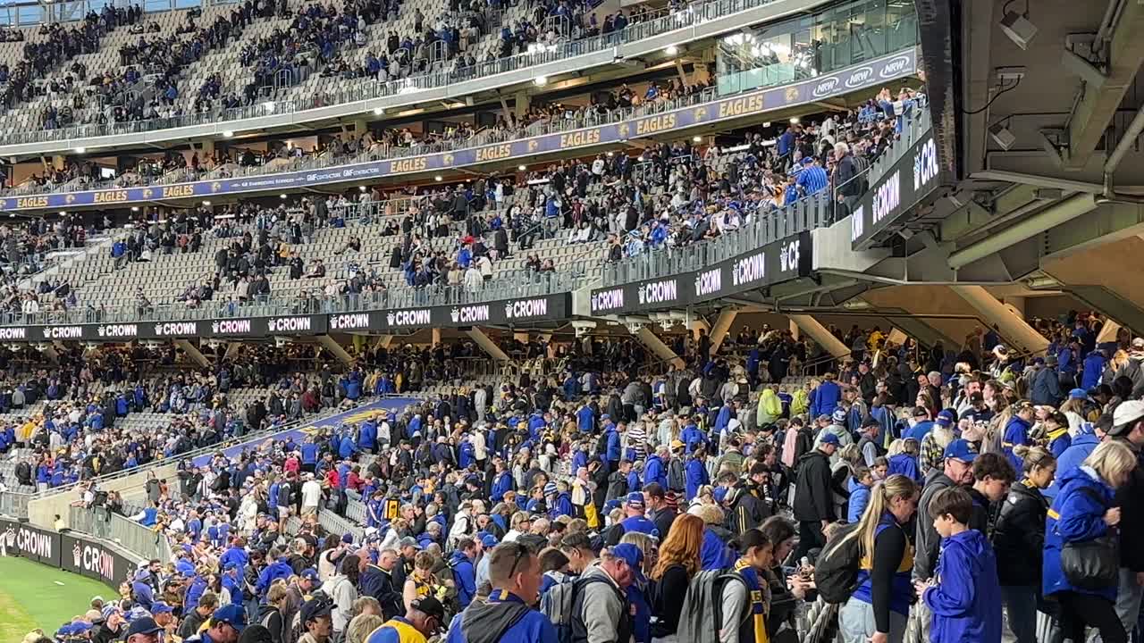 Large crowd gathered at a sports stadium