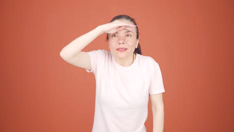 Woman-with-binoculars-looking-away.