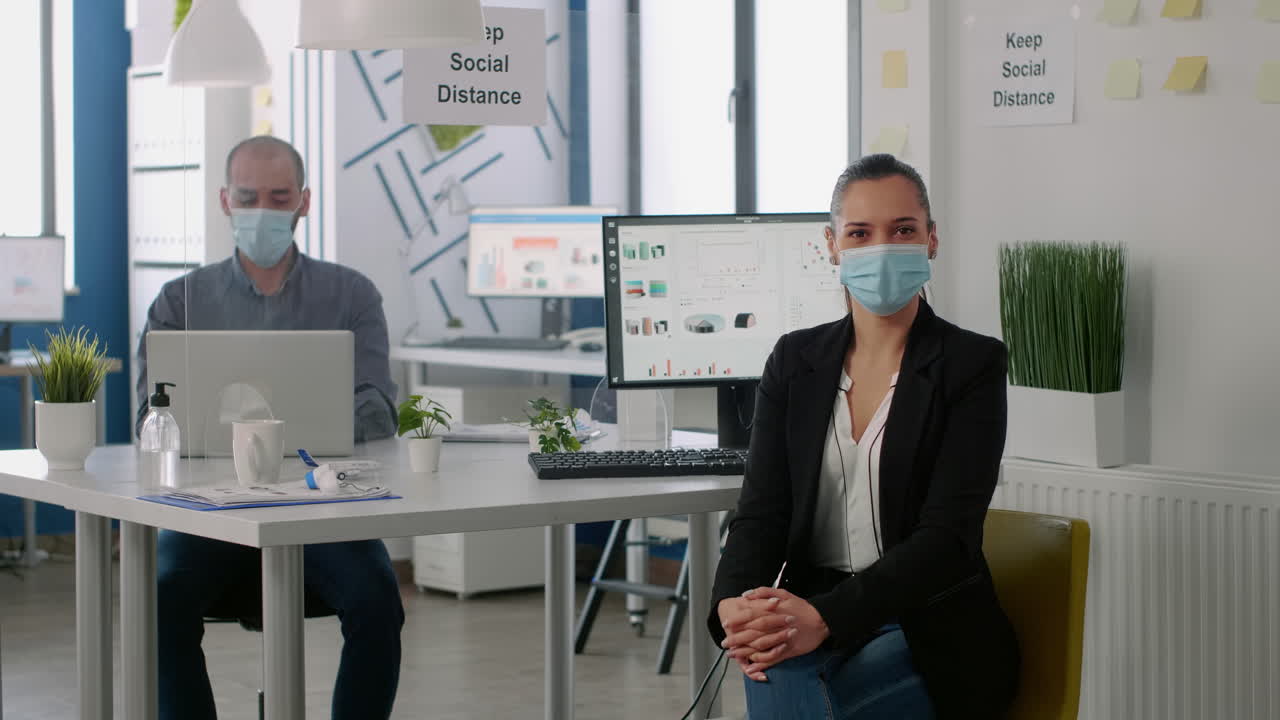 Portrait of manager woman wearing medical face mask