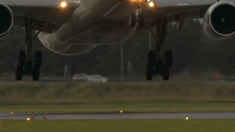 airplane landing on a wet runway