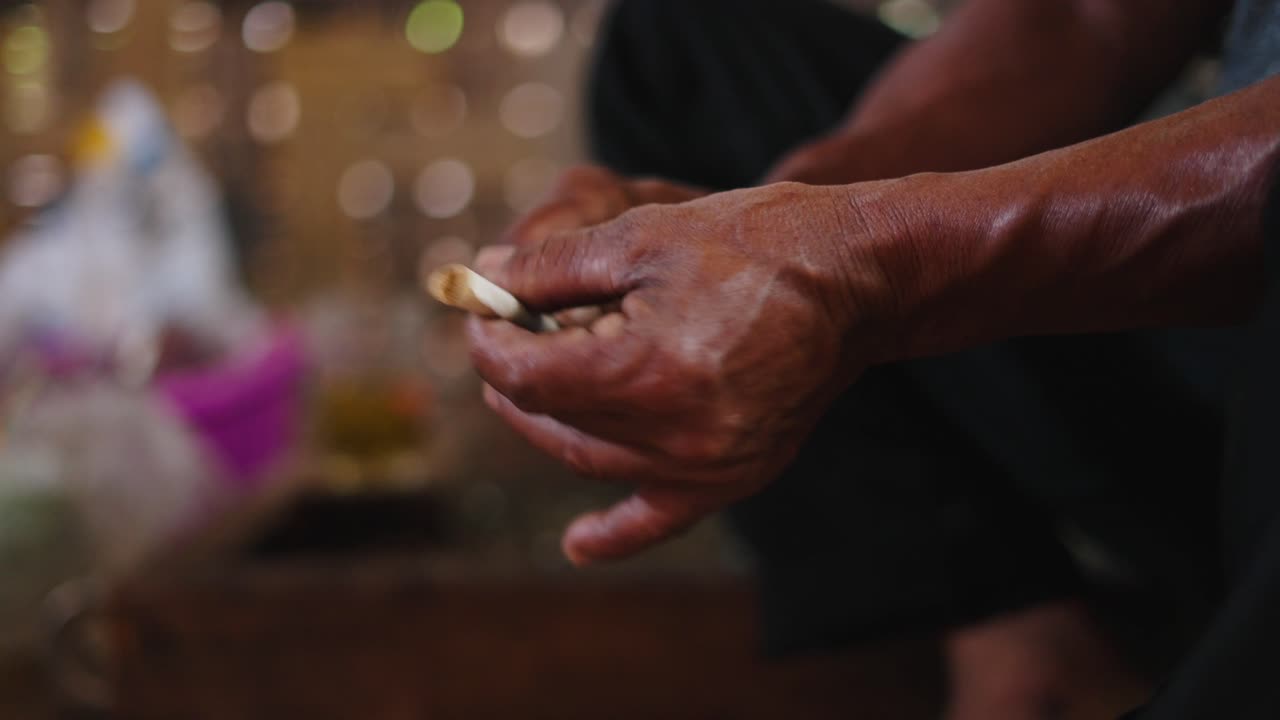 Man rolling a cigarette