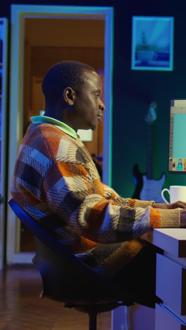 Vertical Video Freelance graphic designer working from home office on editing photos