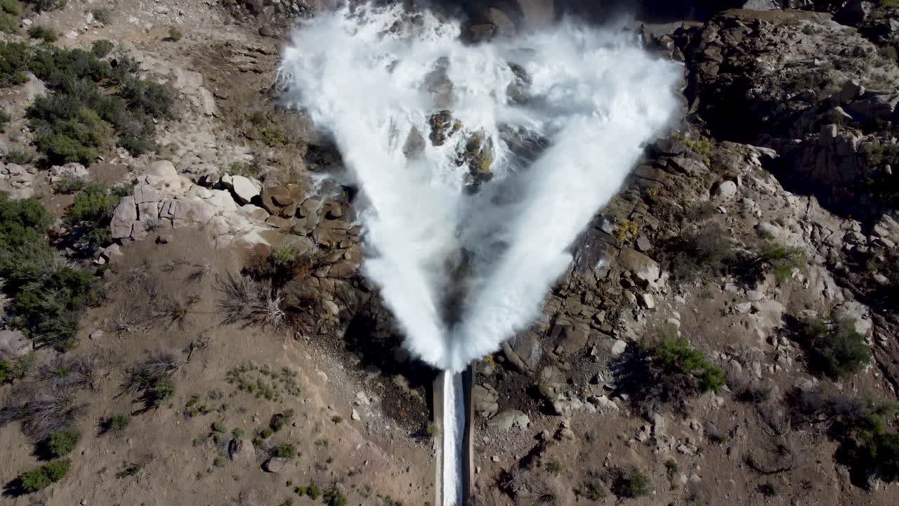 Aerial: waterfall look from above in sunny day