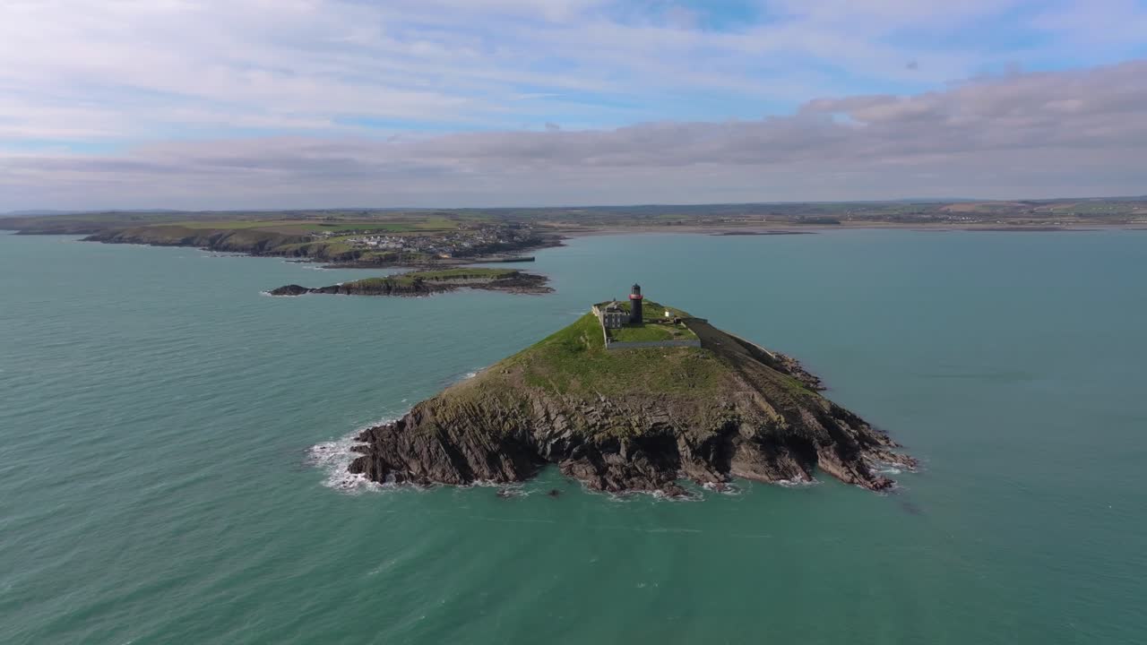 4K Cinematic Drone shot of the black Ballycotton Lighthouse overlooking the Atlantic Ocean, a symbol of Ireland’s maritime heritage Co.Cork - Ireland_14