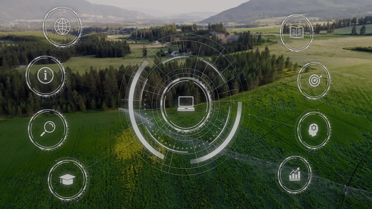 Digital interface animation over aerial view of lush green landscape and mountains