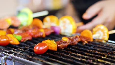 grilling skewers at ao nang night market