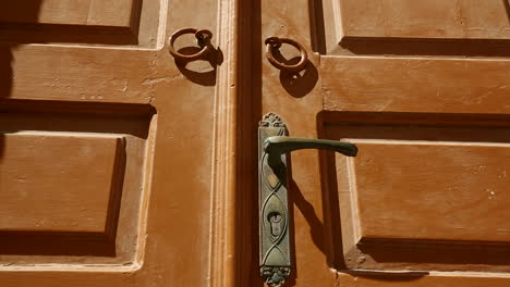 close detail on a beautiful wooden door in a greek village