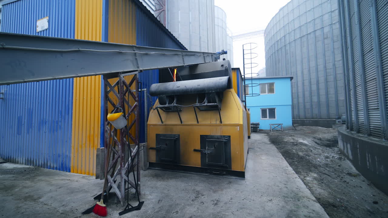 Big factory elevator construction equipment. Industrial agricultural building.