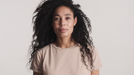 african american smiling woman over white background.