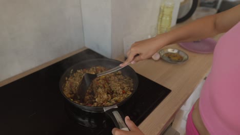 cooking fried rice on the stove