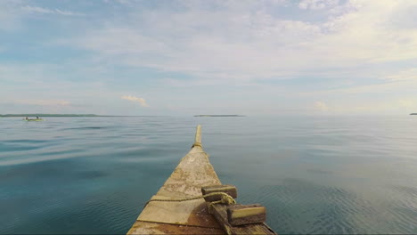 beautiful view of calm waters from the front of a small boat