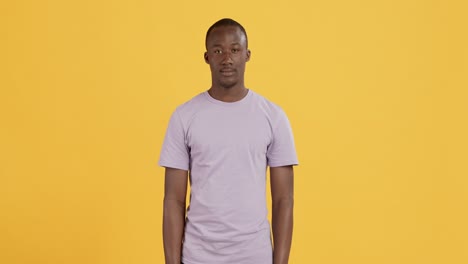 man pointing upward - studio portrait