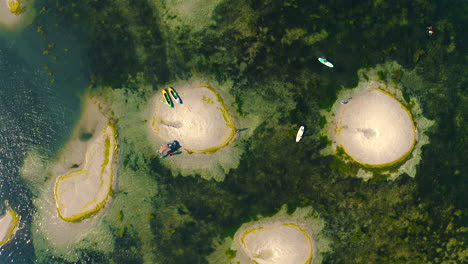 top view of sand islands in the middle of the sea