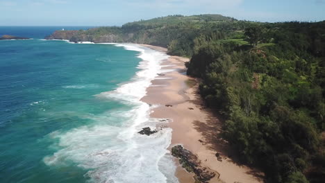 Aerial-view-of-stunning-beach-and-forest-scenery-in-Kauai,-Hawaii