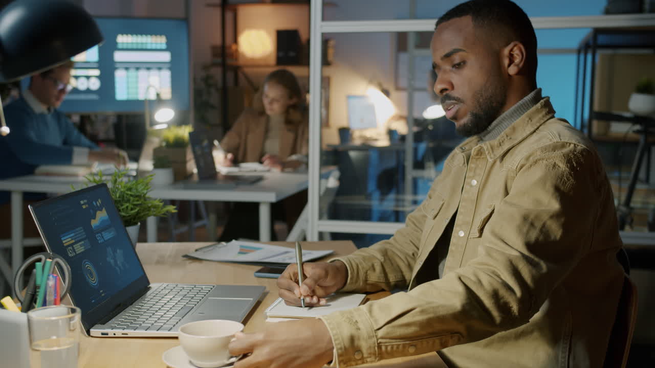 Business Team Working Late at Night in Office
