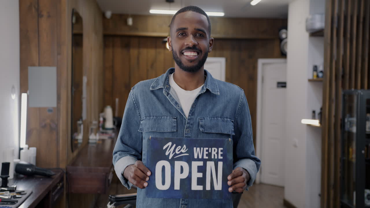 Barber Shop Owner Welcoming Customers