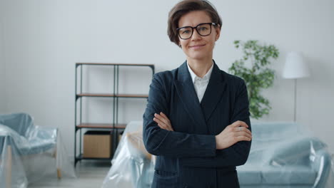 confident businesswoman in a new home