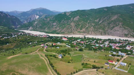 drone shot flying over the town of lahic in azerbaijan while panning up and to the left