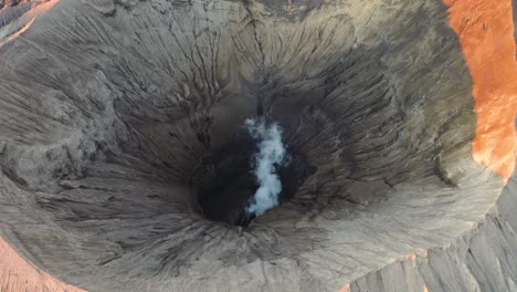 Crater-with-active-volcano-smoke-in-East-Java,-Indonesia