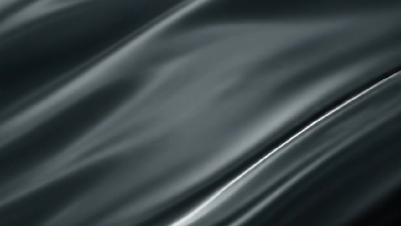 Abstract Flowing Dark Grey Silk Fabric Background