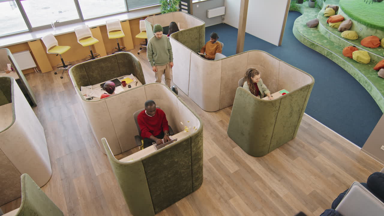 Top View of Man on Self-Balancing Scooter in Office