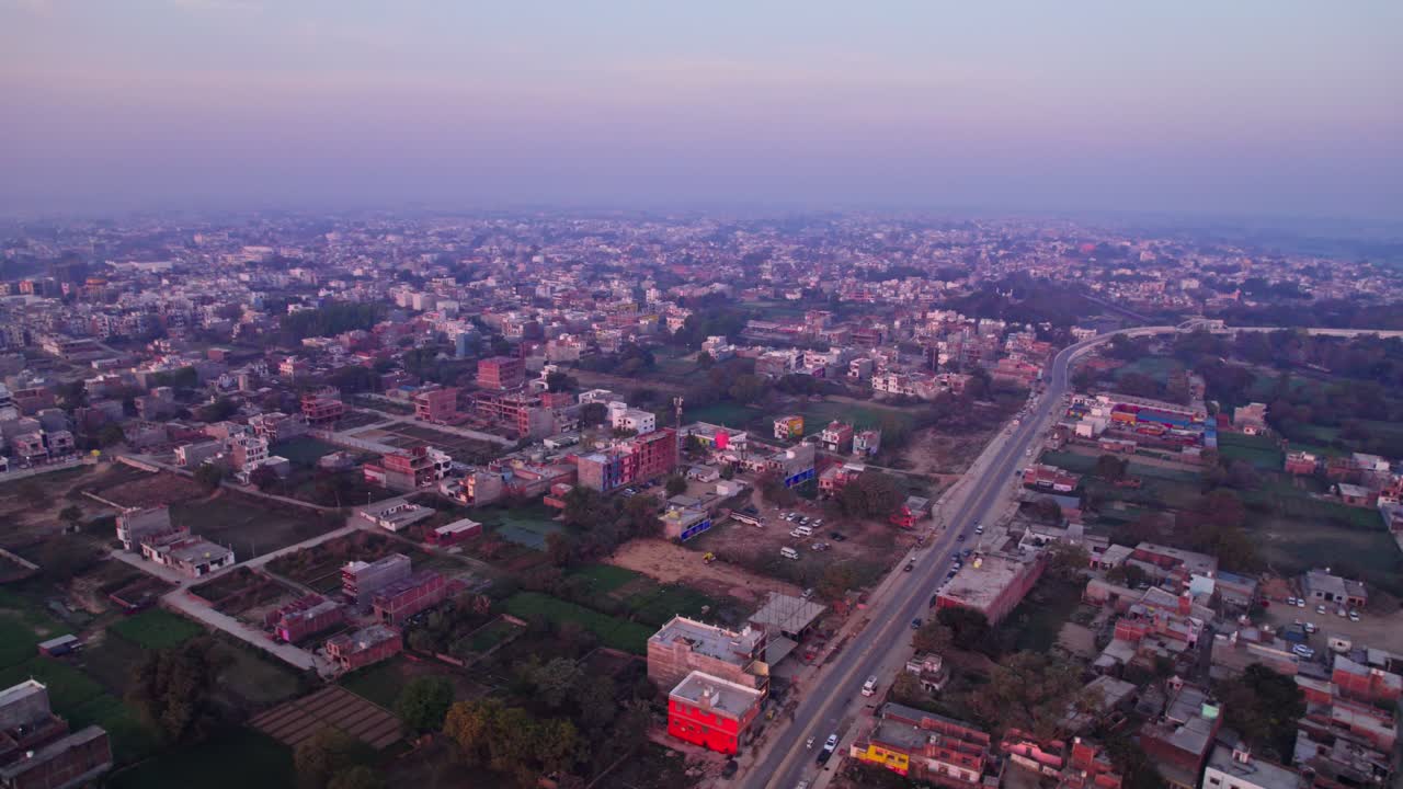 aerial view of ayodhya city with sky, road and farming land,day time, slight pan shot, drone shot, 4k.