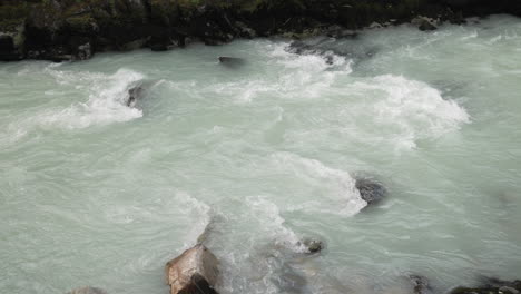 rocky white water rapids at the forest -british columbia -slowmo