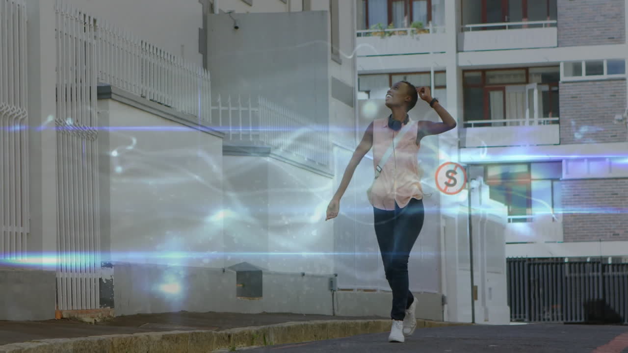 Walking on street, person surrounded by glowing light trails animation