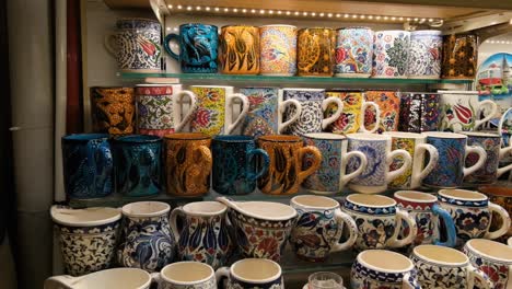 Tracking-Shot-of-Colourful-Mugs