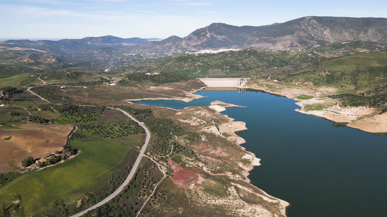 Aerial Drone over the Zahara-El Gastor Reservoir and Dam. Beautiful Lake.