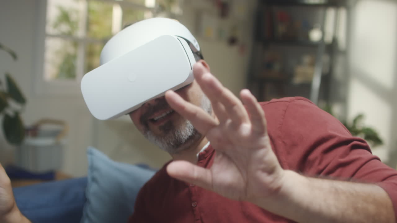 Man experiencing virtual reality with a VR headset at home