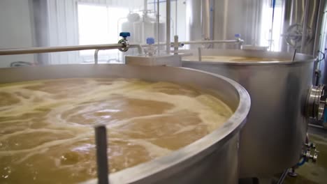 a detailed look at the brewing process: harvesting rich flavors and aromas from the boiling wort in a commercial brewery kettle