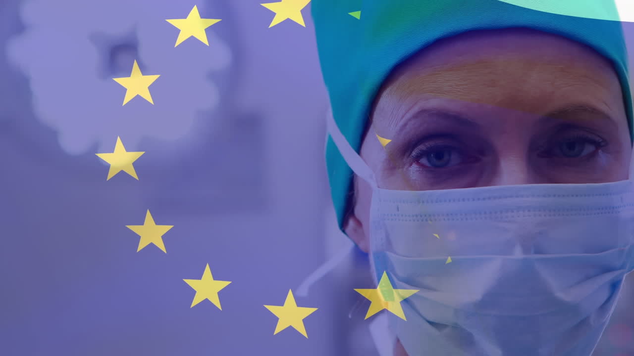 animación de la bandera de europa, primer plano de una doctora caucásica con máscara de pie en el hospital
