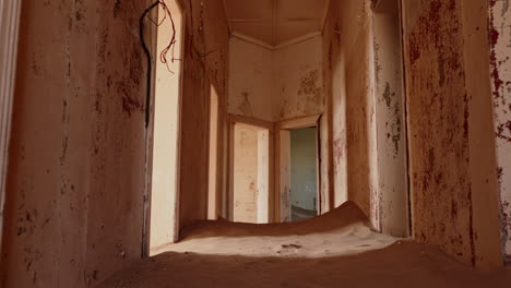 abandoned house filled with sand