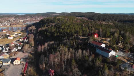 rural open-air museum named gammelgarden in bengtsfors city in sweden, aerial view during sunny day