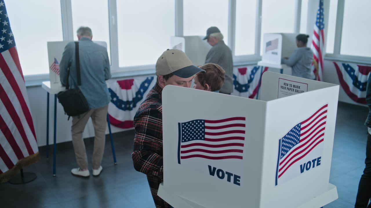 Family voting together at the polling station